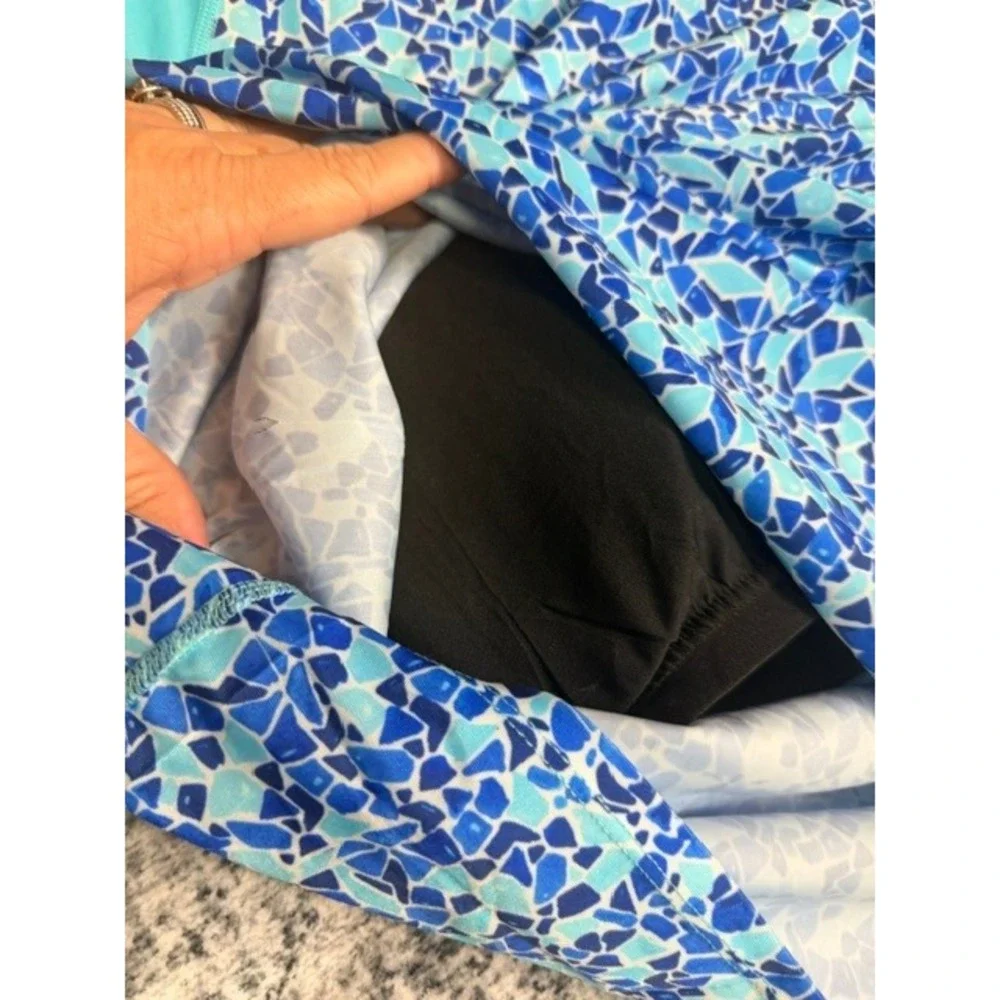 Women's blue swim shirt with built in shelf bra Size L